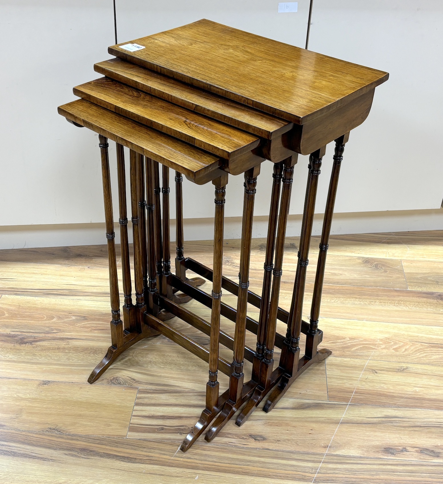 A 19th century quartetto of rosewood tea tables, width 50cm, depth 30cm, height 78cm